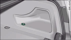 Audi A4: Cigarette lighter and electrical sockets. Detail of the side trim in the luggage compartment: 12 Volt socket